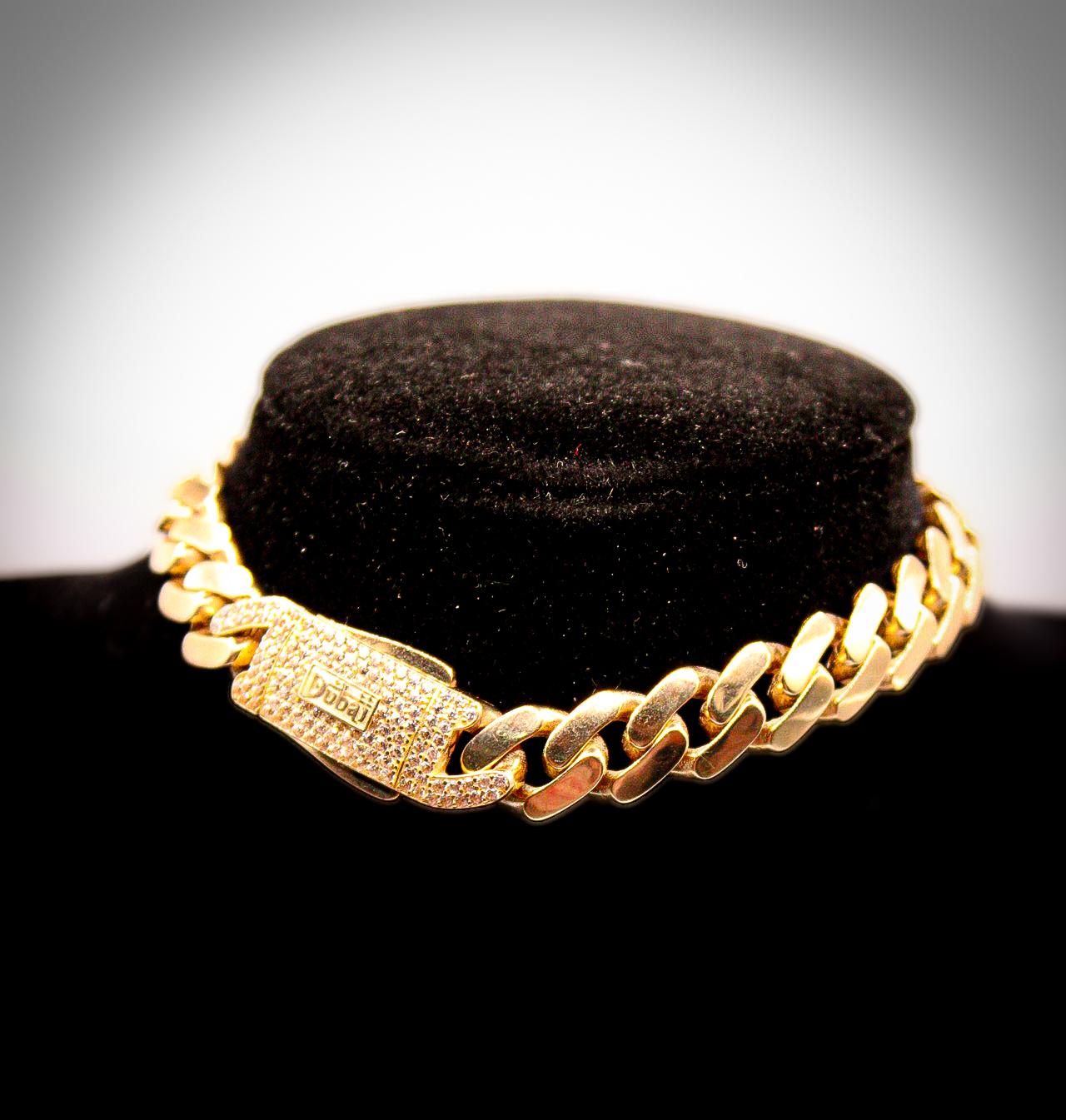 Gold Cuban Link Bracelet with Diamond Clasp
